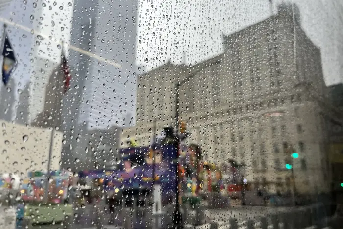 lower Manhattan seen through a rainy bus window